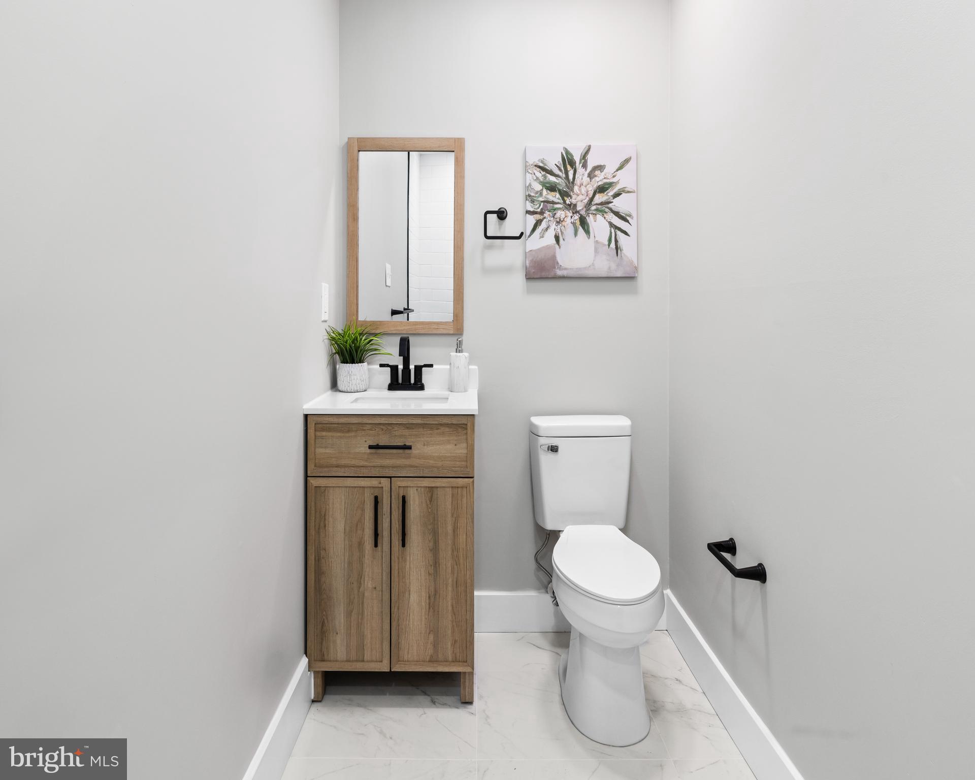 147 Sooy Place Road Tabernacle, NJ 08088 - Photo 19 of 27 a bathroom with a toilet sink and mirror