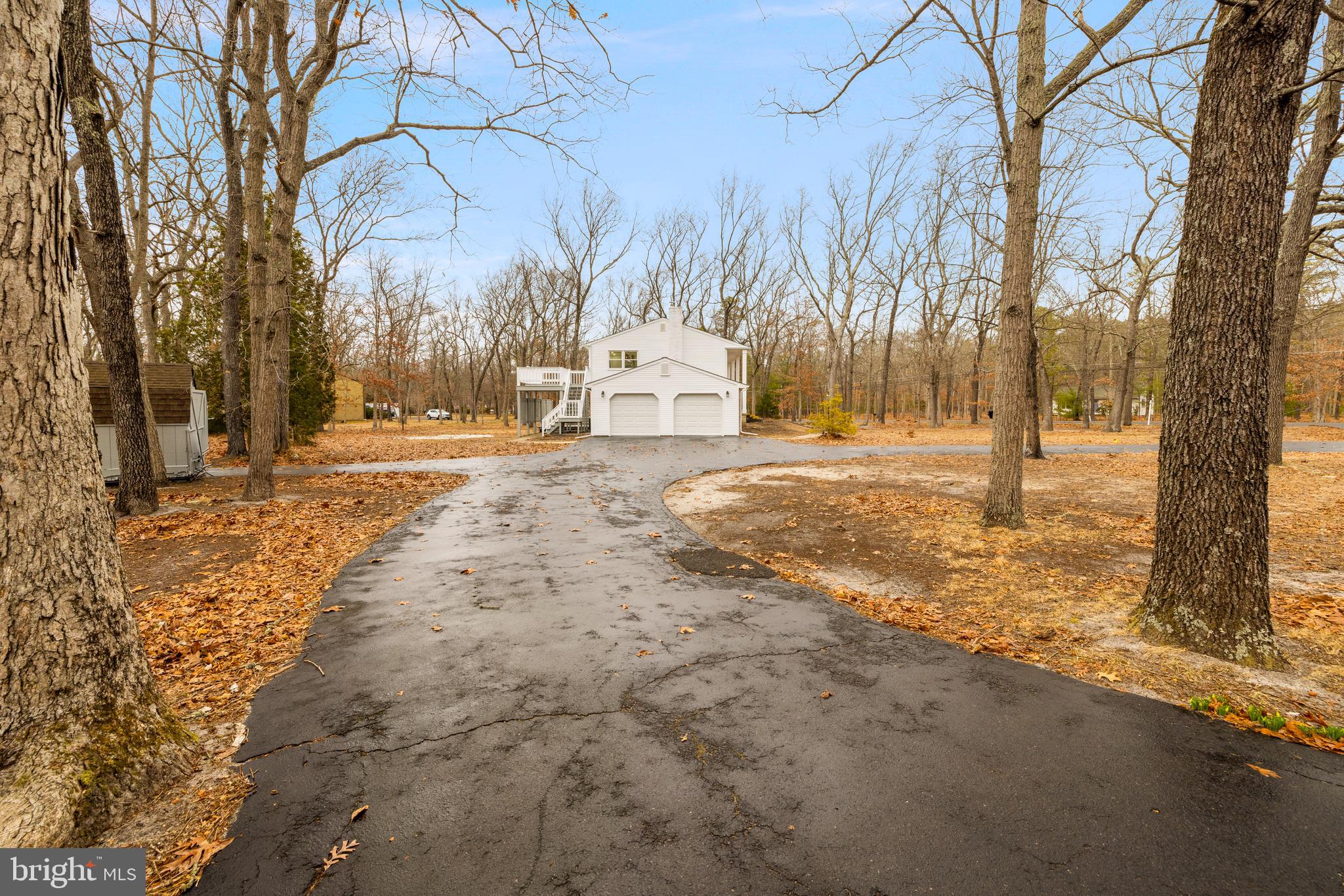 147 Sooy Place Road Tabernacle, NJ 08088 - Photo 24 of 27 a view of a yard with snow on the tree