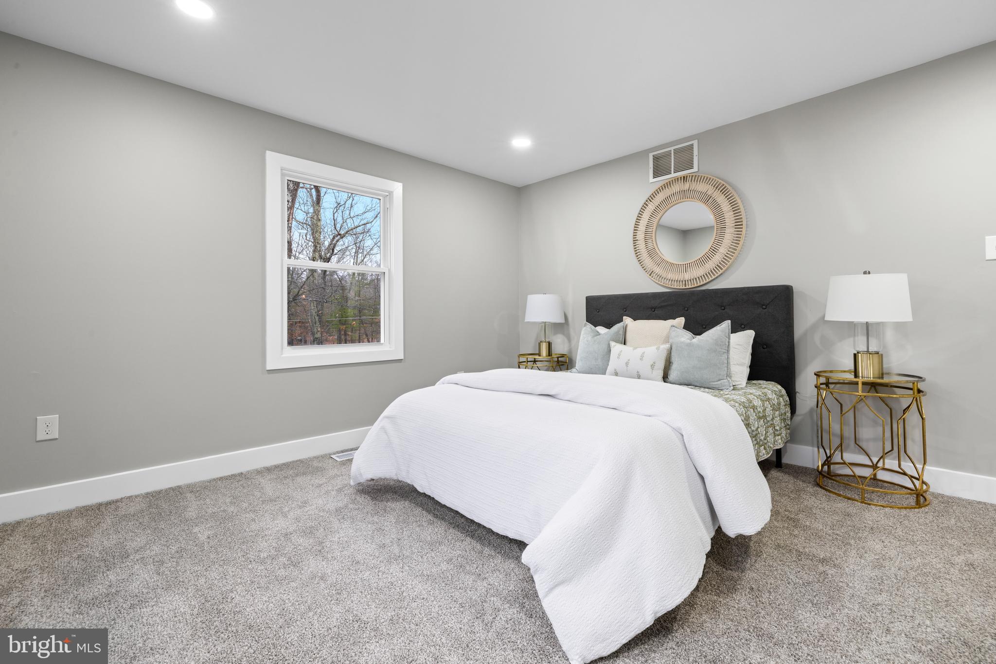 147 Sooy Place Road Tabernacle, NJ 08088 - Photo 10 of 27 a bedroom with a bed and window