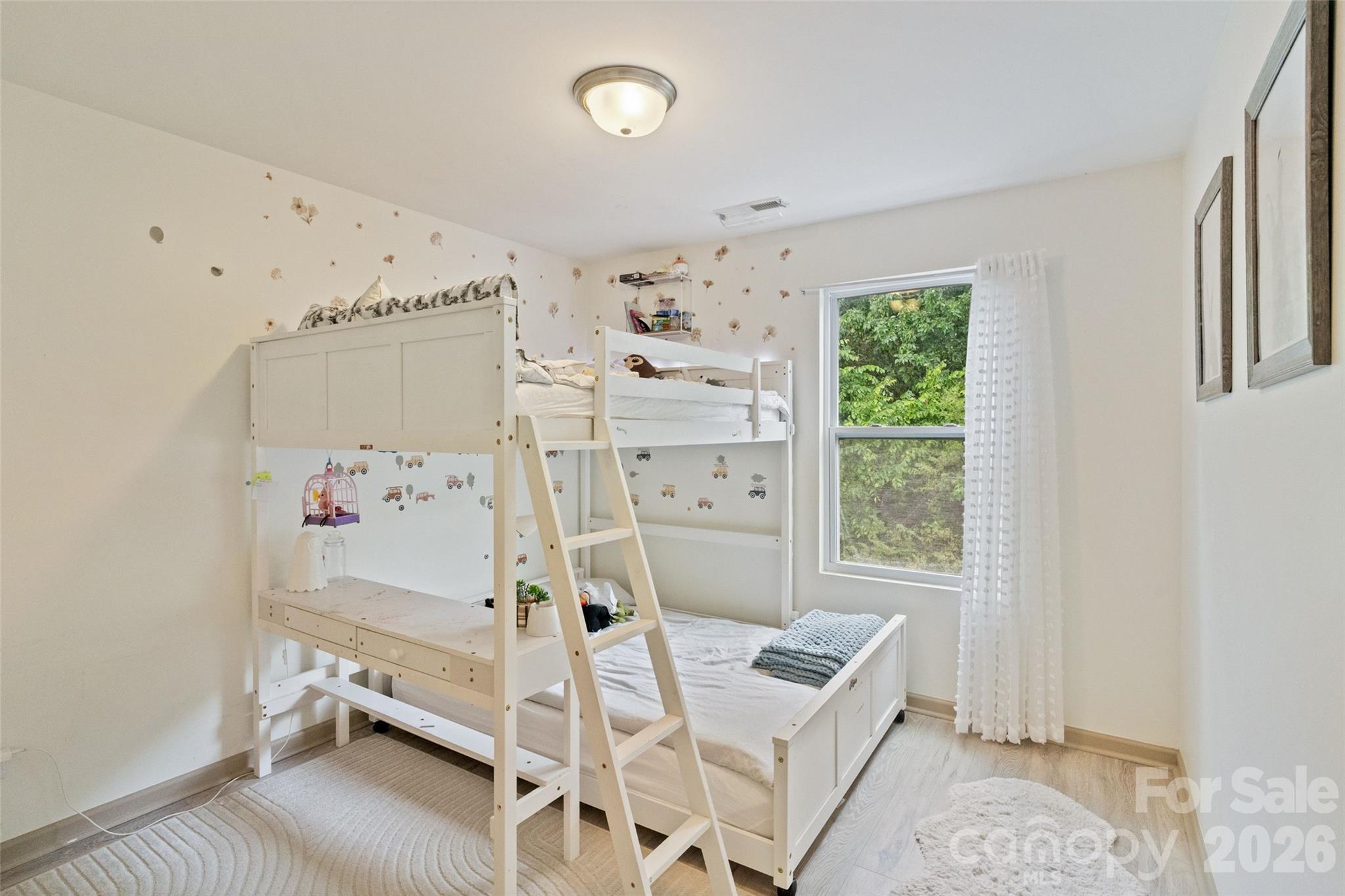 8726 Conrad Street Locust, NC 28097 - Photo 23 of 36 a bedroom with furniture and a window