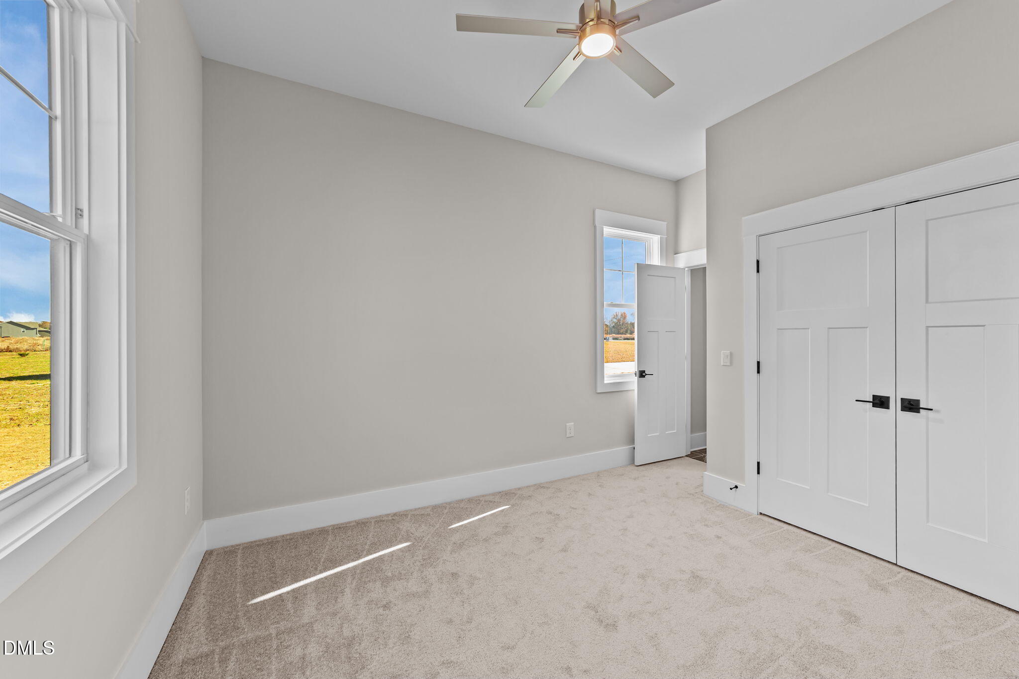 2568 Lassiter Road Four Oaks, NC 27524 - Photo 14 of 50 a view of an empty room with a window
