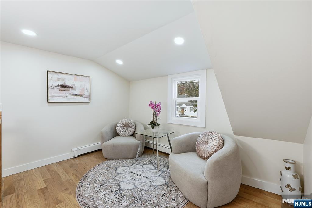 20 Dojean Court Bergenfield, NJ 07621 - Photo 16 of 30 a living room with furniture and a window