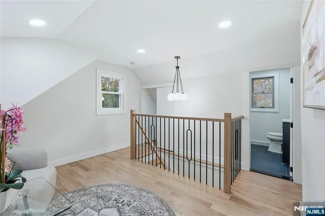 a bedroom with furniture and window