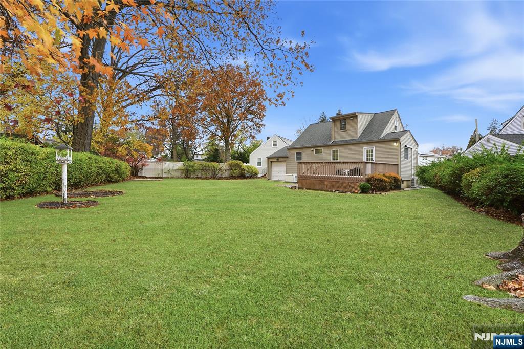 20 Dojean Court Bergenfield, NJ 07621 - Photo 30 of 30 a front view of a house with a yard