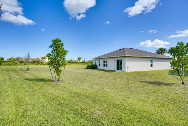 a house view with a garden space