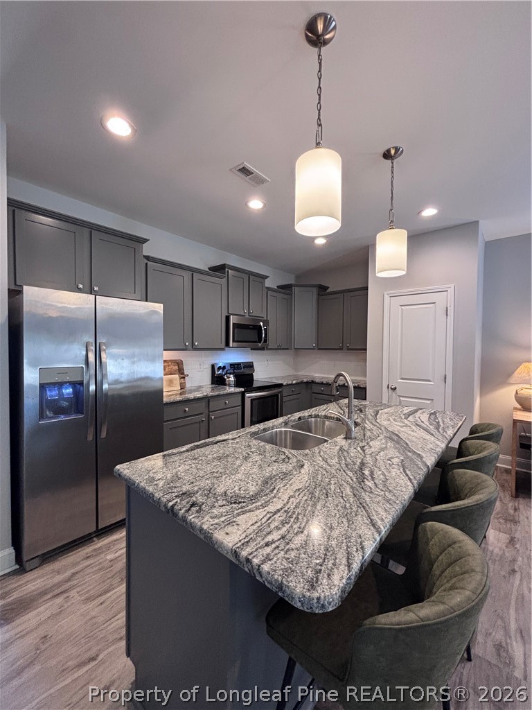 7720 Rufus Johnson Road Fayetteville, NC 28306 - Photo 23 of 50 a view of a kitchen and kitchen island