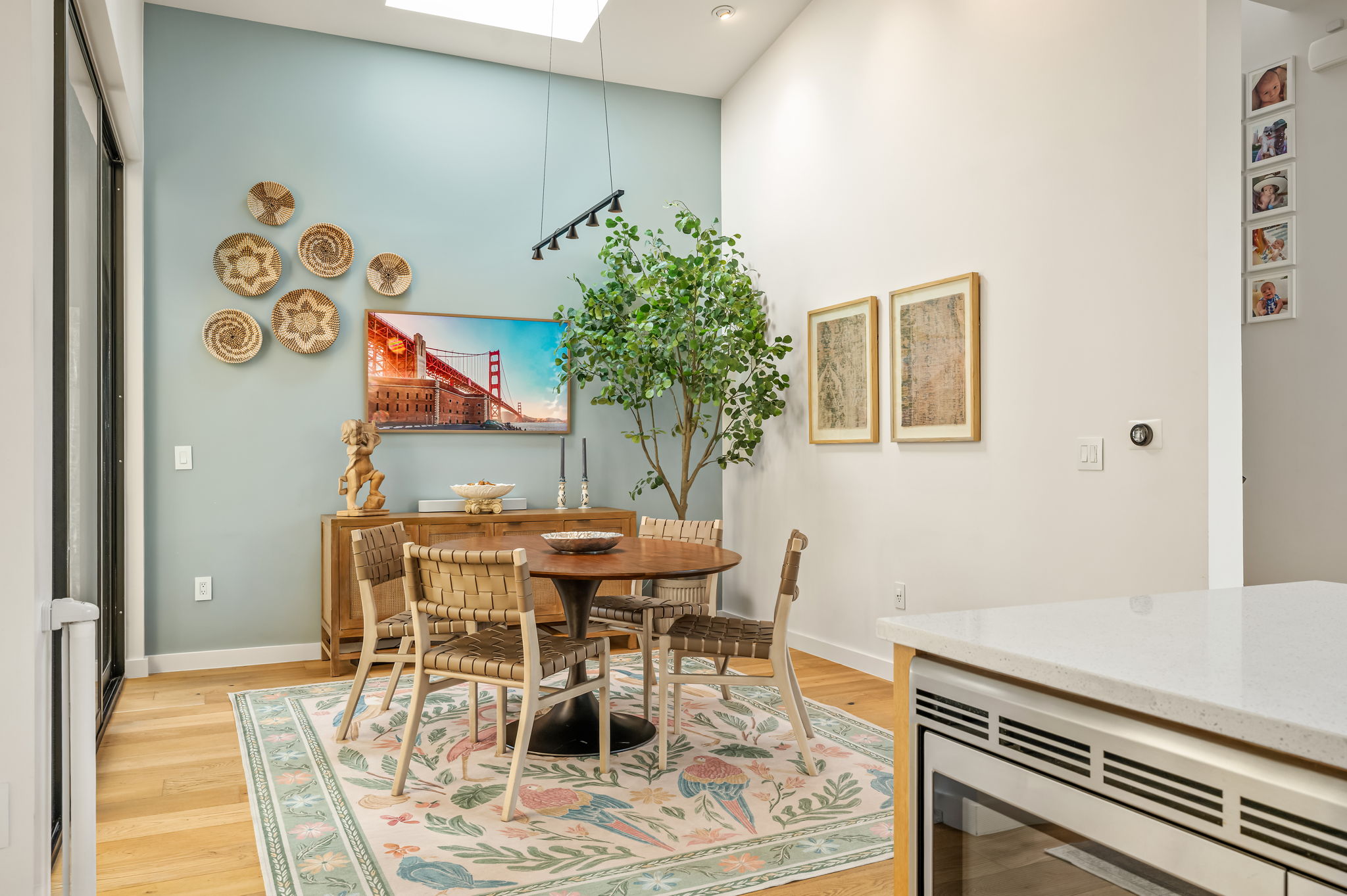 1811 Collier Street Austin, TX 78704 - Photo 13 of 40 Dining space with light wood finished floors, a skylight, and a high ceiling