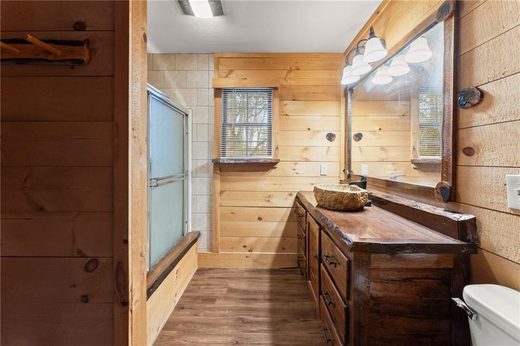 279 Cindy Cove Road Blairsville, GA 30512 - Photo 14 of 46 a bathroom with a sink a toilet and shower