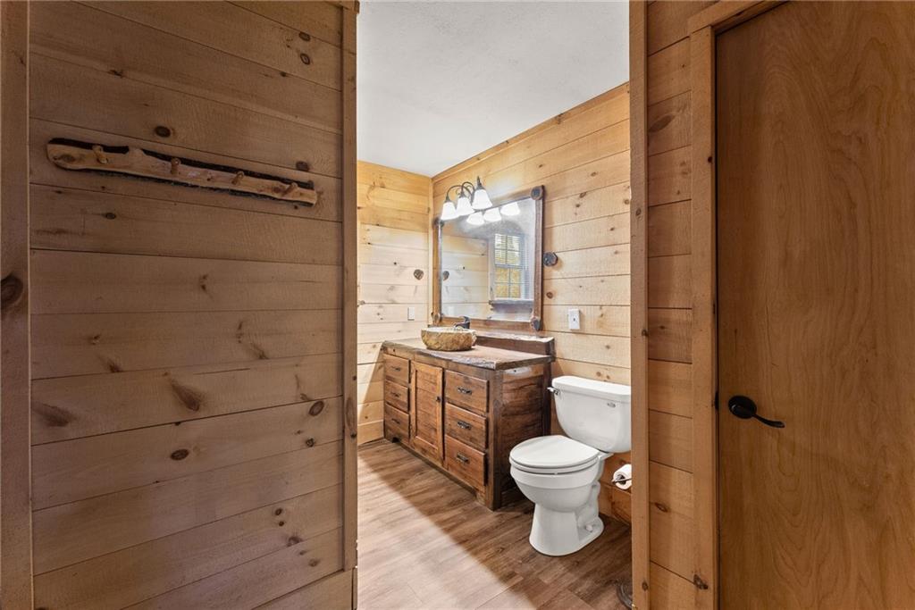 279 Cindy Cove Road Blairsville, GA 30512 - Photo 15 of 46 a bathroom with a toilet a sink and a shower