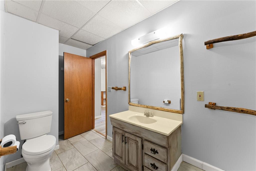 279 Cindy Cove Road Blairsville, GA 30512 - Photo 20 of 46 a bathroom with a sink a toilet and shower
