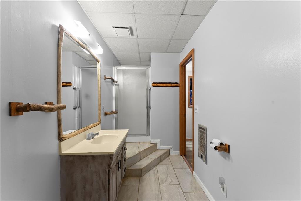 279 Cindy Cove Road Blairsville, GA 30512 - Photo 21 of 46 a bathroom with a sink and mirror