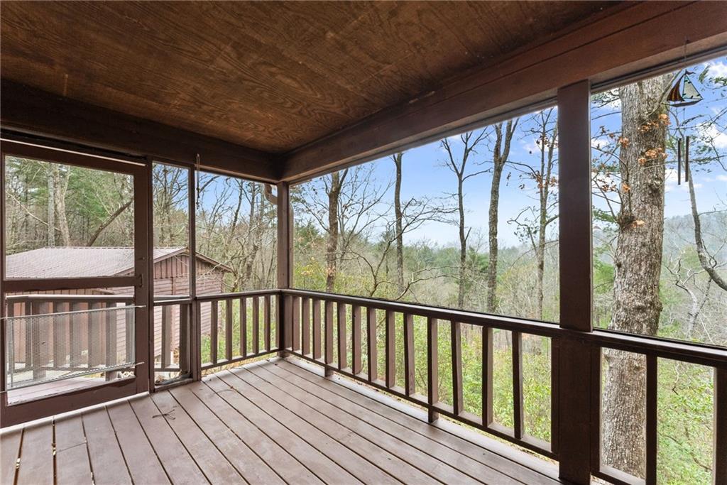 279 Cindy Cove Road Blairsville, GA 30512 - Photo 27 of 46 a view of a balcony with wooden floor