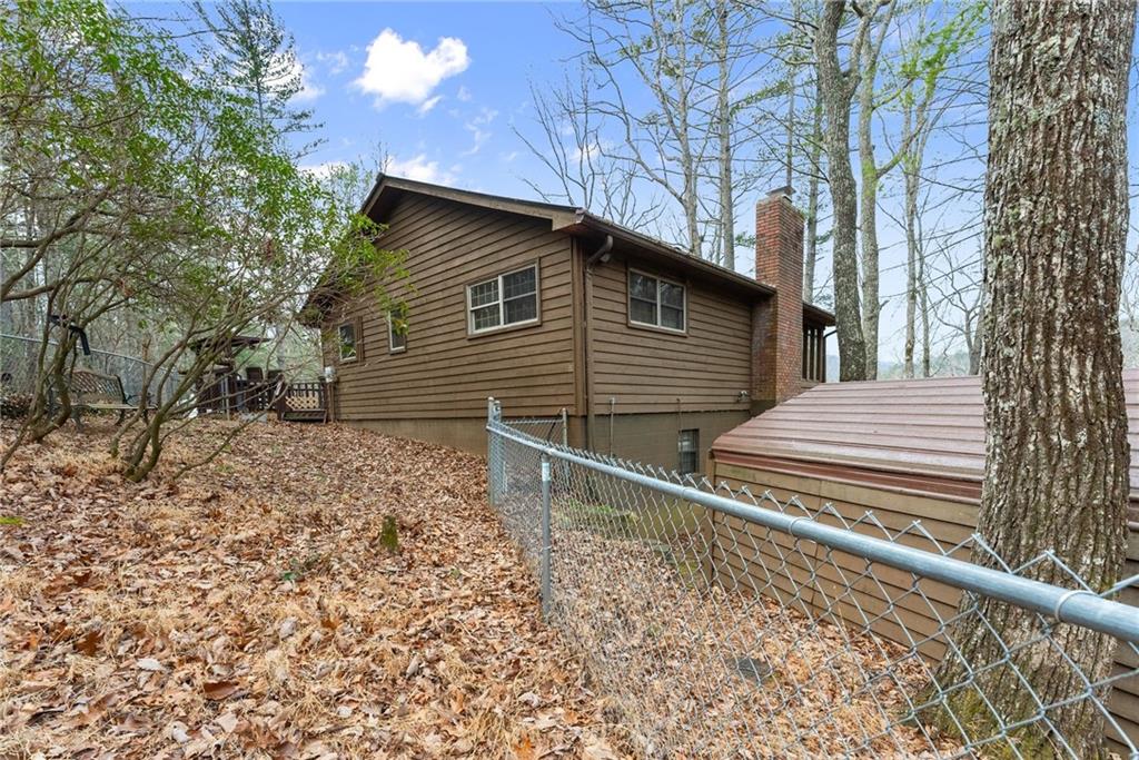 279 Cindy Cove Road Blairsville, GA 30512 - Photo 38 of 46 a side view of a house with a yard