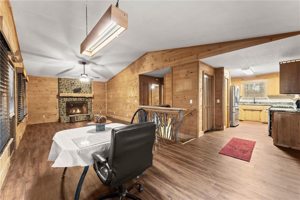 279 Cindy Cove Road Blairsville, GA 30512 - Photo 9 of 46 a living room with fireplace furniture and a wooden floor