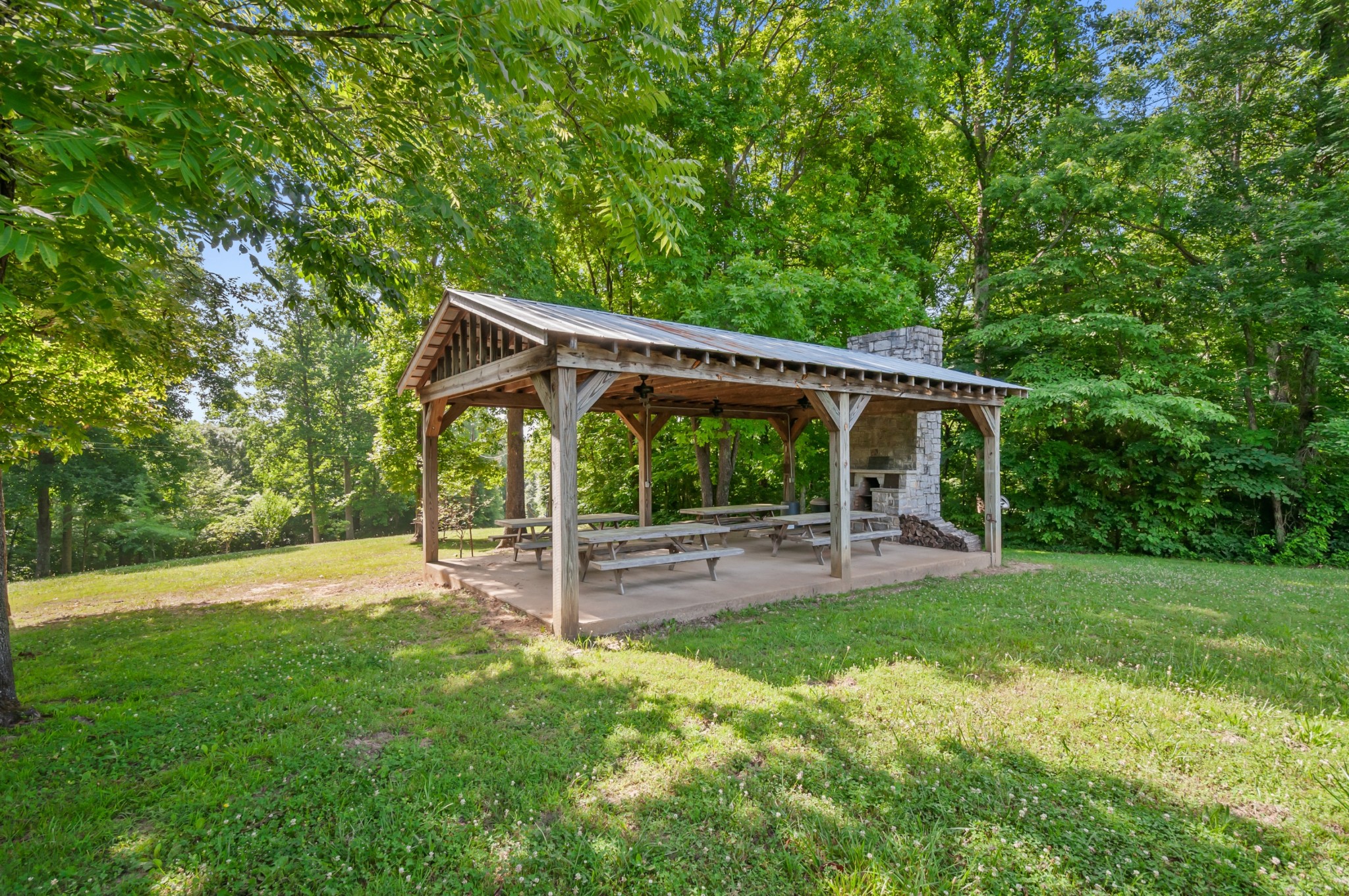 7480 South Harpeth Road Franklin, TN 37064 - Photo 12 of 51 a view of a house with a backyard and a large tree