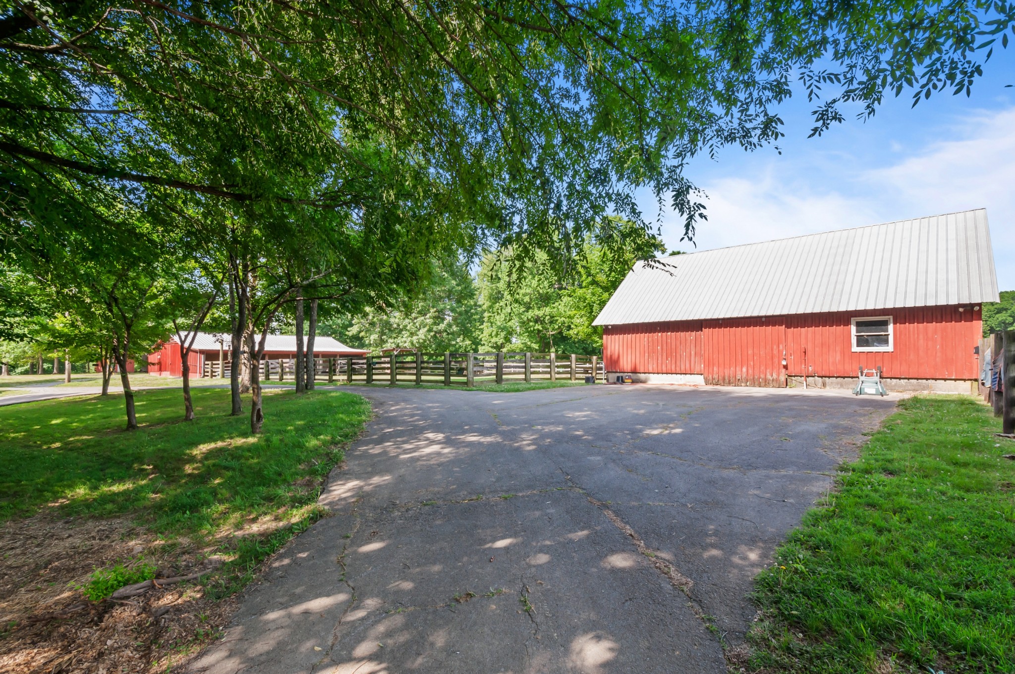 7480 South Harpeth Road Franklin, TN 37064 - Photo 20 of 51 a view of a yard with plants and trees