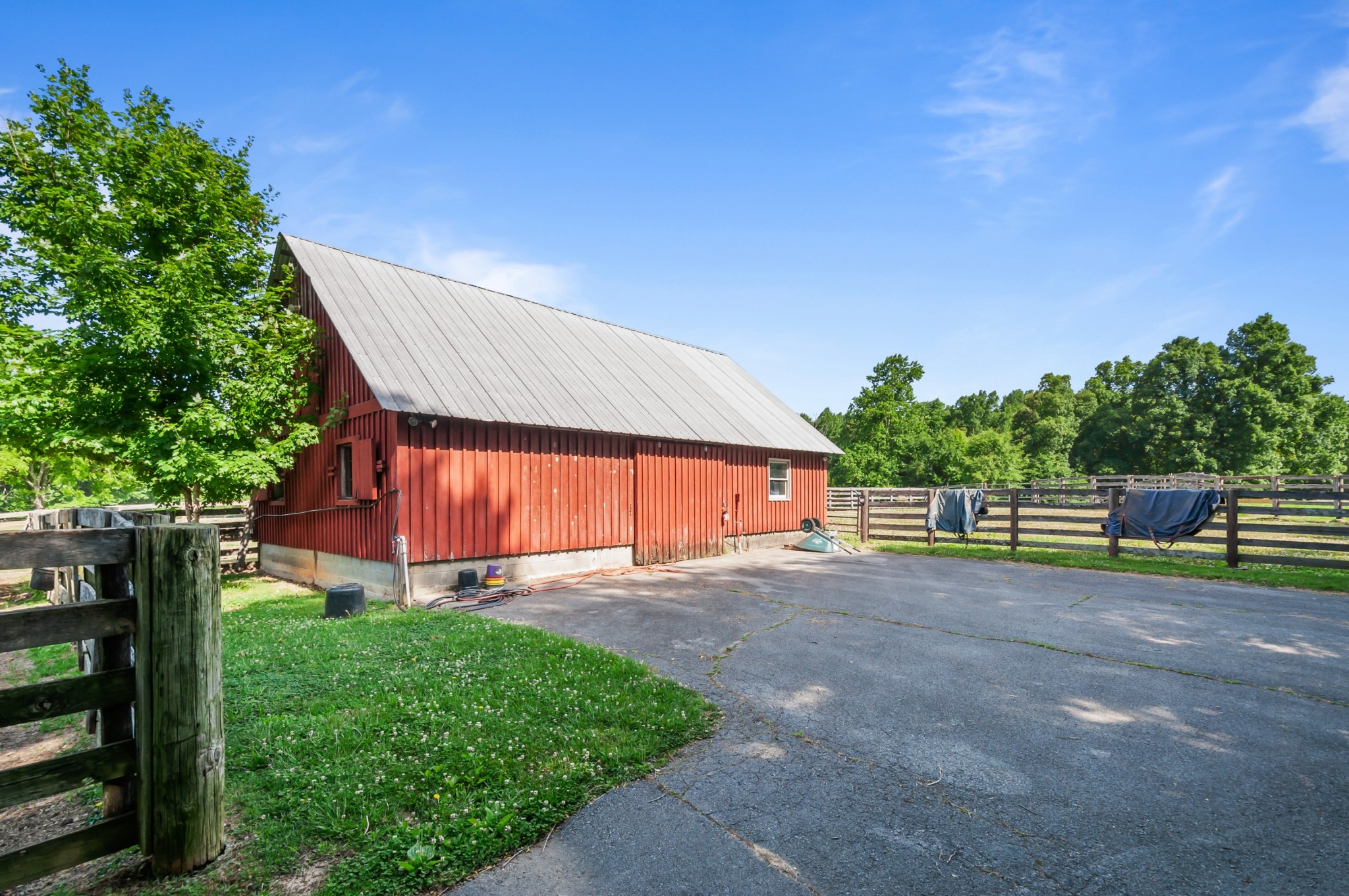7480 South Harpeth Road Franklin, TN 37064 - Photo 24 of 51 a view of a backyard with plants and trees