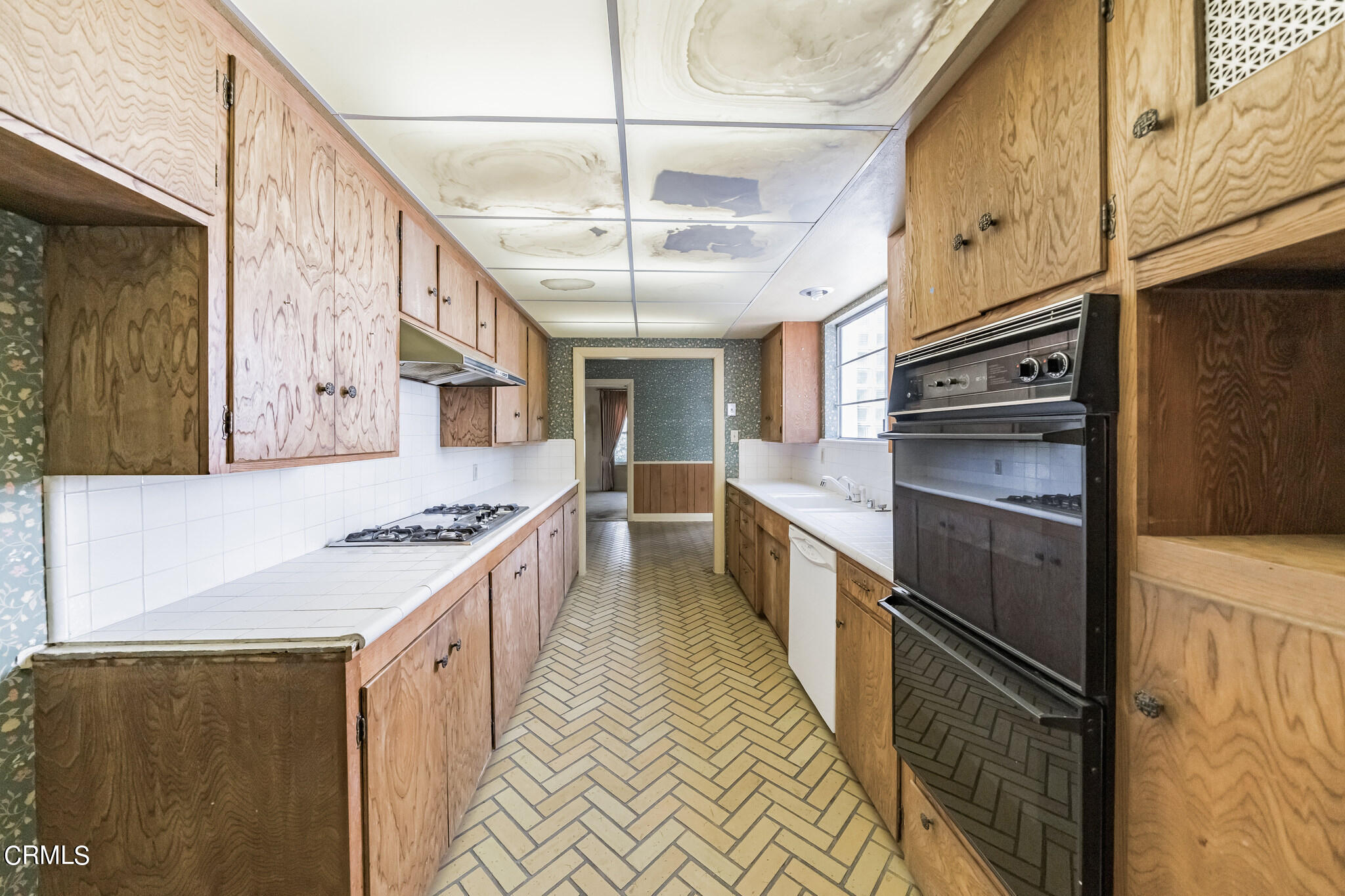 503 West Le Roy Avenue Arcadia, CA 91007 - Photo 14 of 33 a kitchen with stainless steel appliances granite countertop a stove and a sink