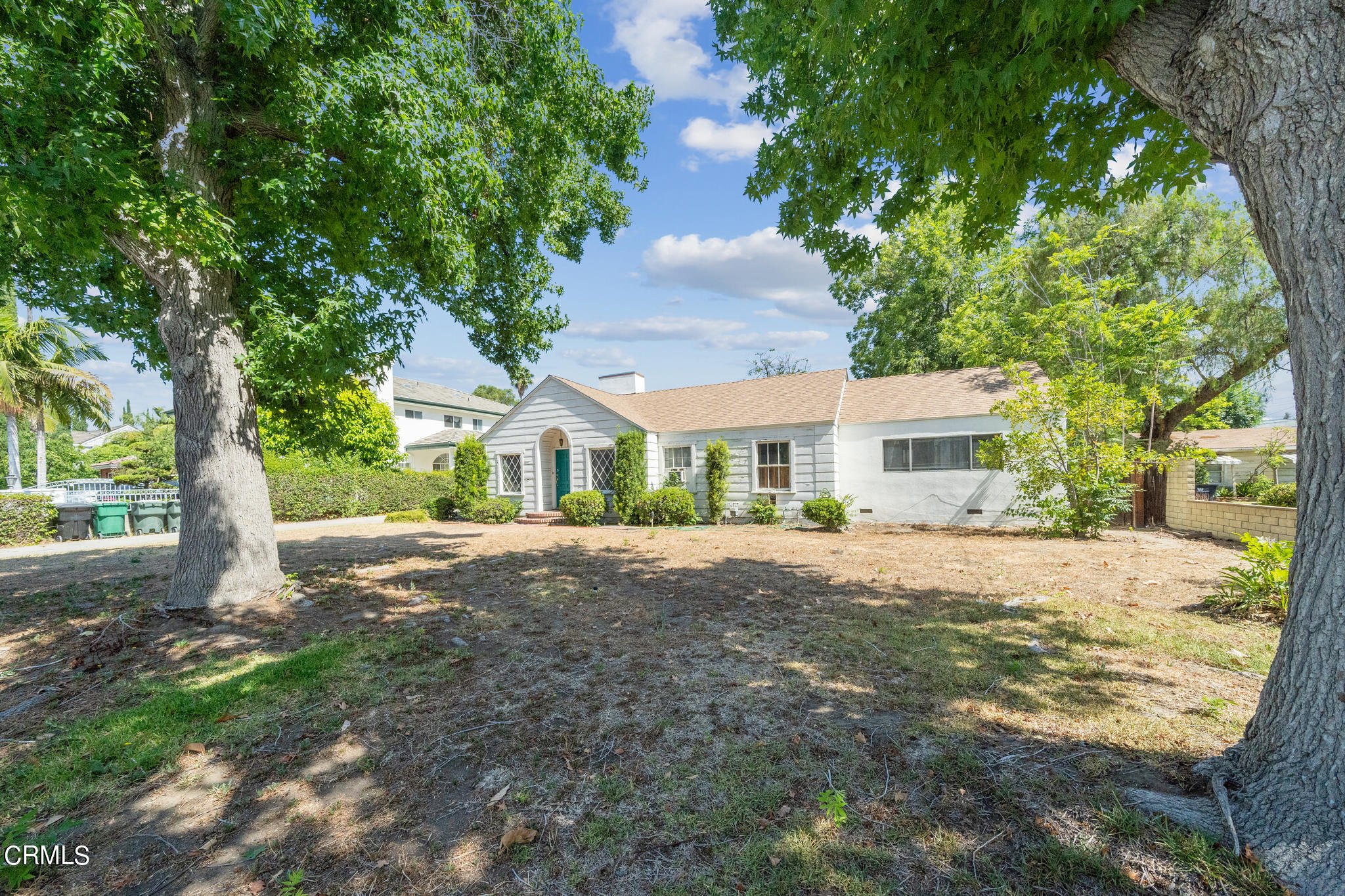 503 West Le Roy Avenue Arcadia, CA 91007 - Photo 3 of 33 a front view of a house with a garden and tree
