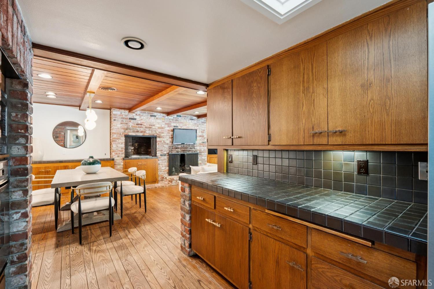 1348 Reliez Valley Road Lafayette, CA 94549 - Photo 15 of 61 a kitchen with stainless steel appliances granite countertop a stove a sink dishwasher and cabinets with wooden floor