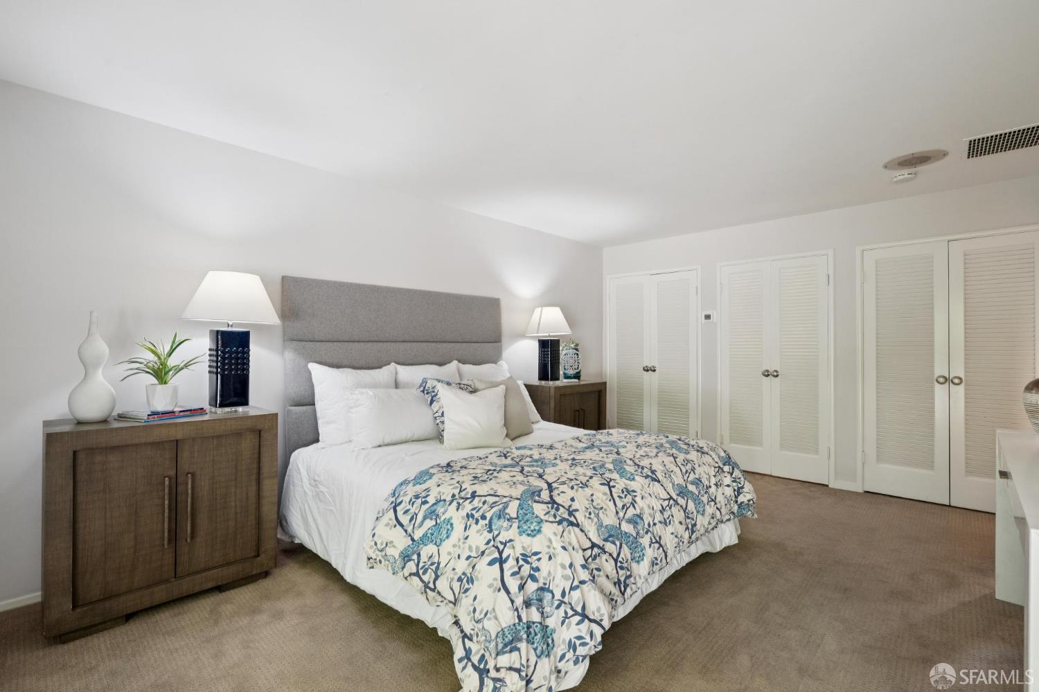 1348 Reliez Valley Road Lafayette, CA 94549 - Photo 24 of 61 a bedroom with a bed and lamps