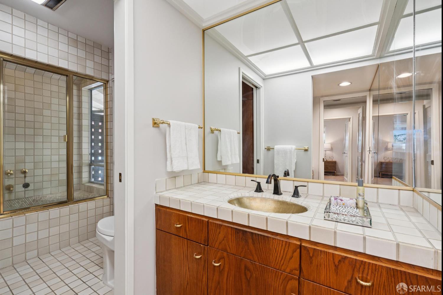 1348 Reliez Valley Road Lafayette, CA 94549 - Photo 27 of 61 a bathroom with a sink double vanity shower and a mirror