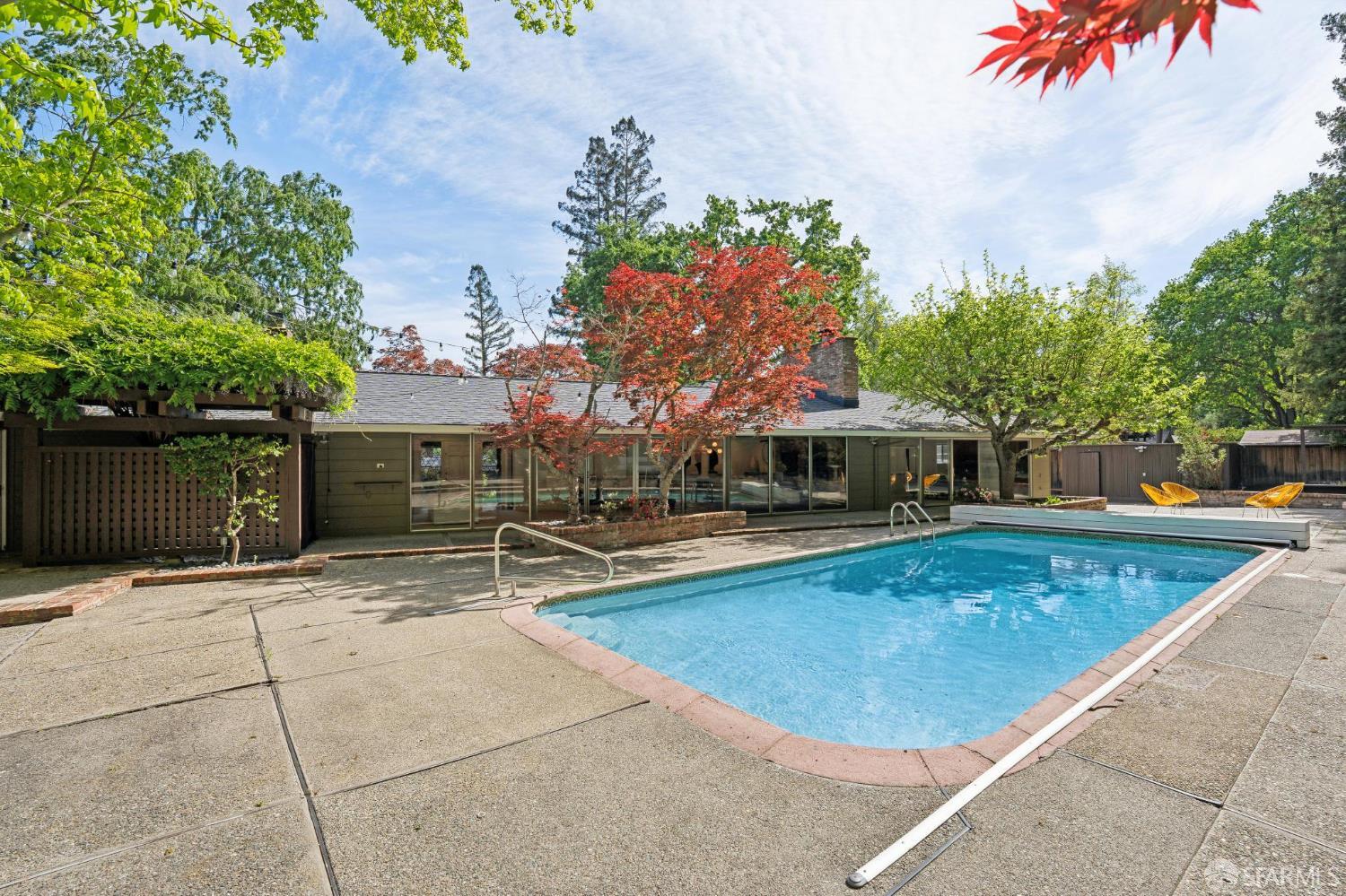 1348 Reliez Valley Road Lafayette, CA 94549 - Photo 48 of 61 a view of a swimming pool with a patio