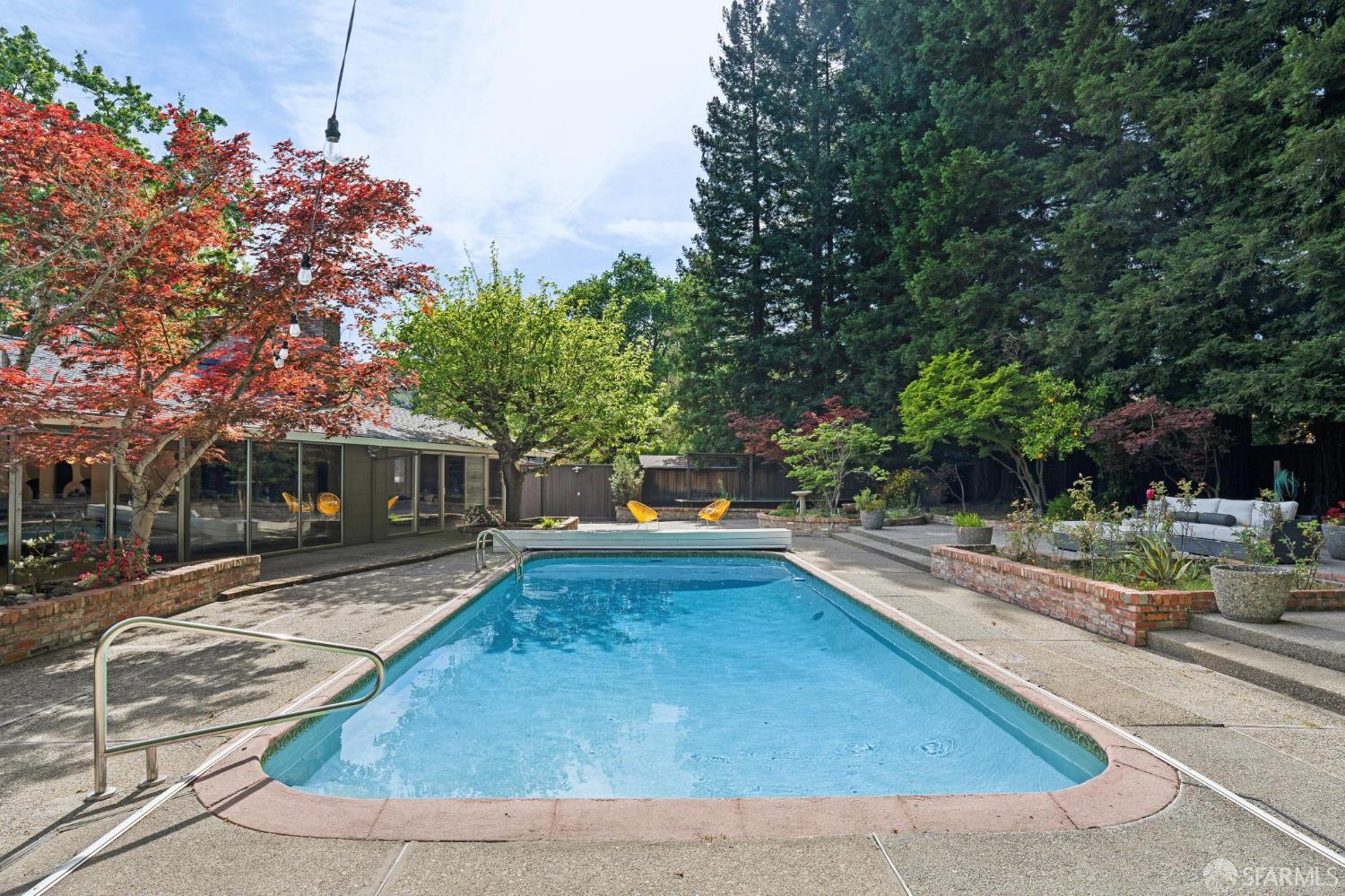 1348 Reliez Valley Road Lafayette, CA 94549 - Photo 50 of 61 a view of a white house with a yard