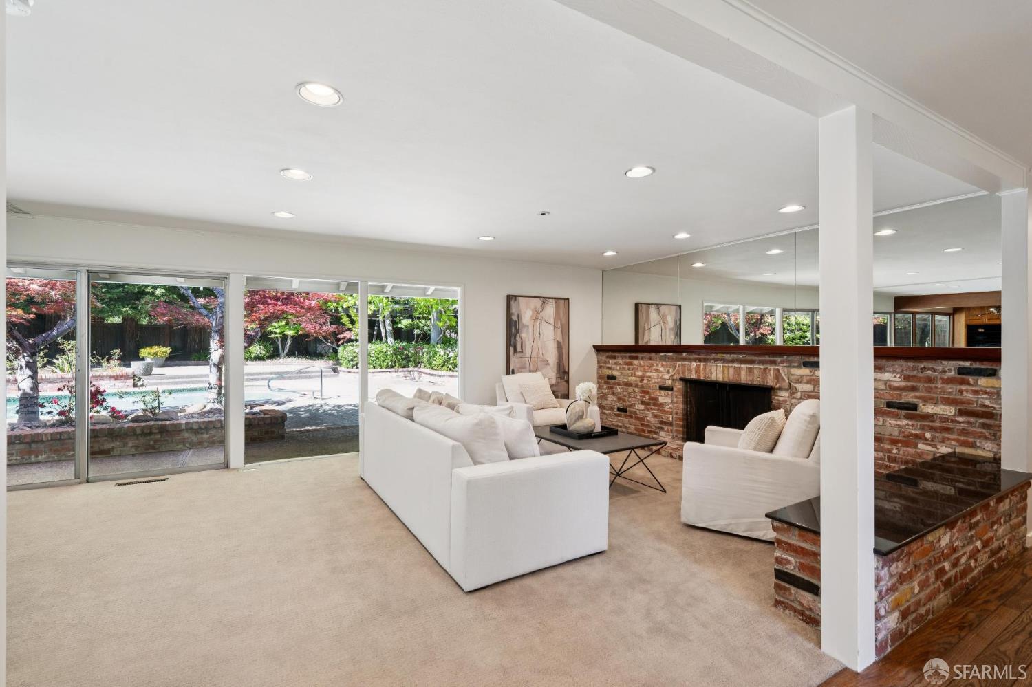 1348 Reliez Valley Road Lafayette, CA 94549 - Photo 6 of 61 a living room with fireplace furniture and a kitchen view