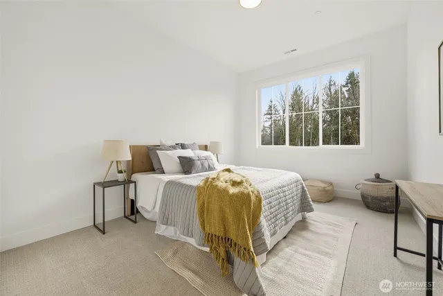 a bathroom with a sink a mirror and a light fixture