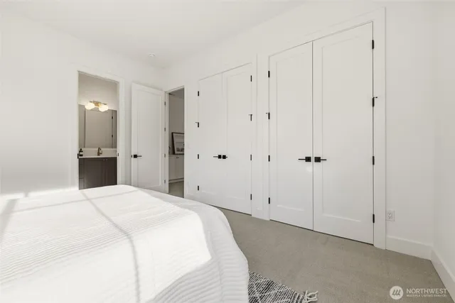 a bathroom with a sink vanity tub and shower
