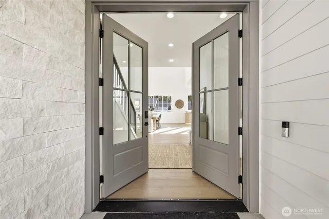 a living room with furniture and a rug