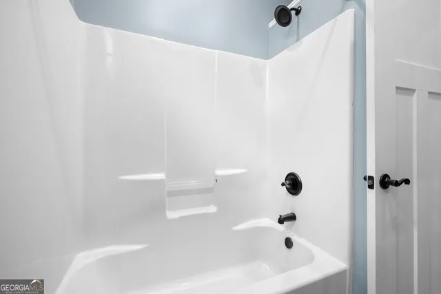 a bathroom with a bathtub