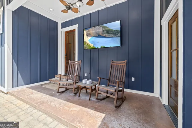 a view of a livingroom with couch and a window