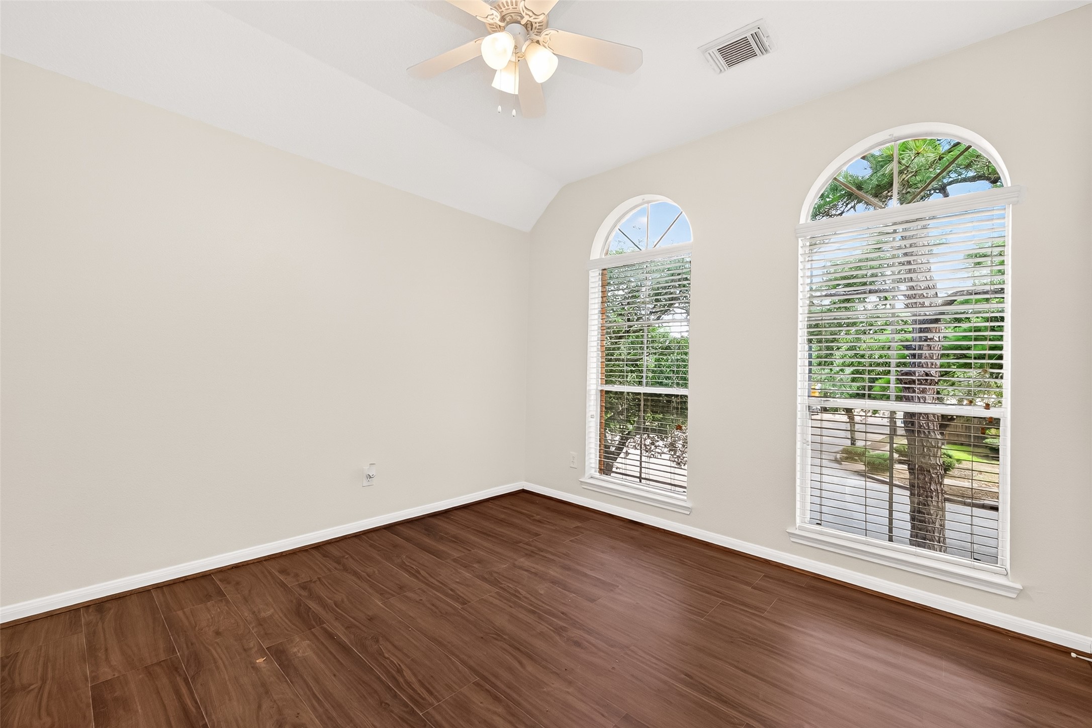12831 Dove Point Lane Houston, TX 77041 - Photo 46 of 50 Third Bedroom upstairs offers plenty of natural light, wood flooring and walk ing closet.
