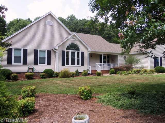 7704 Knollcrest Drive Oak Ridge, NC 27310 - Photo 1 of 16 Exterior Front.