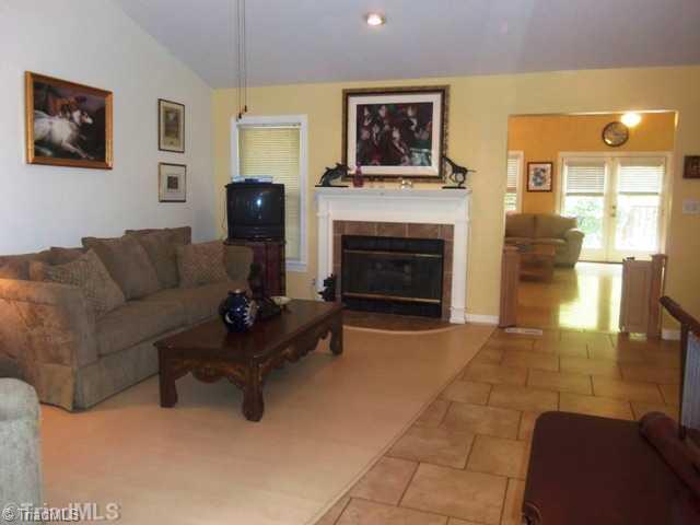 7704 Knollcrest Drive Oak Ridge, NC 27310 - Photo 12 of 16 Den/Family/Great Room. den from front hall
