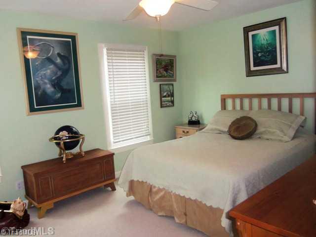 7704 Knollcrest Drive Oak Ridge, NC 27310 - Photo 14 of 16 Master Bedroom.