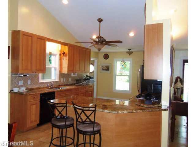 7704 Knollcrest Drive Oak Ridge, NC 27310 - Photo 6 of 16 Kitchen.
