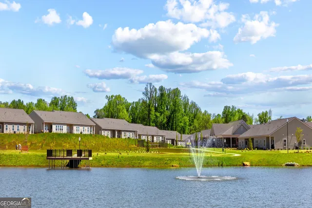 a view of a house with a big yard