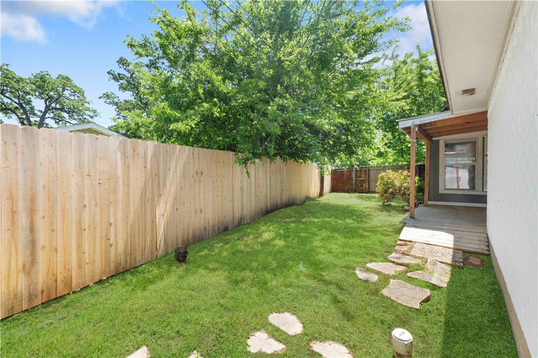 4403 Robinhood Circle Bryan, TX 77803 - Photo 19 of 19 a backyard of a house with seating space
