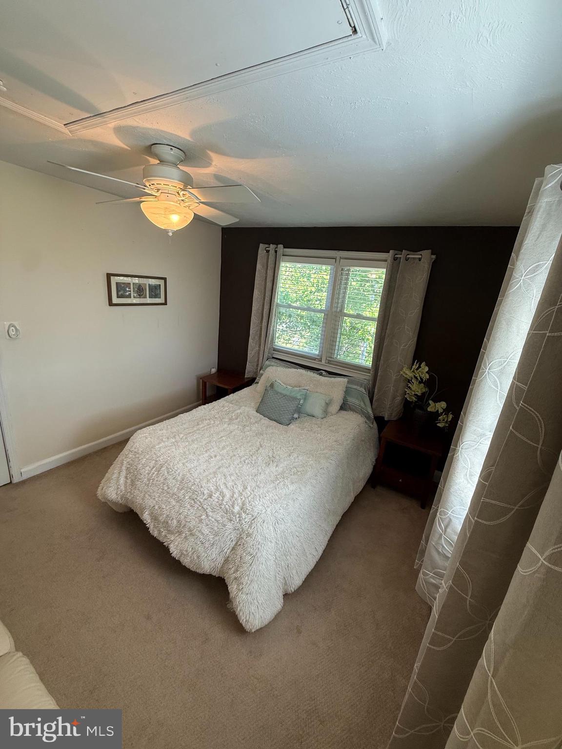 2235 Hawthorne Road Baltimore, MD 21220 - Photo 16 of 35 a bedroom with a bed and a window