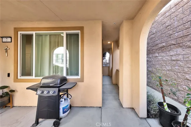 a view of a livingroom with furniture and windows