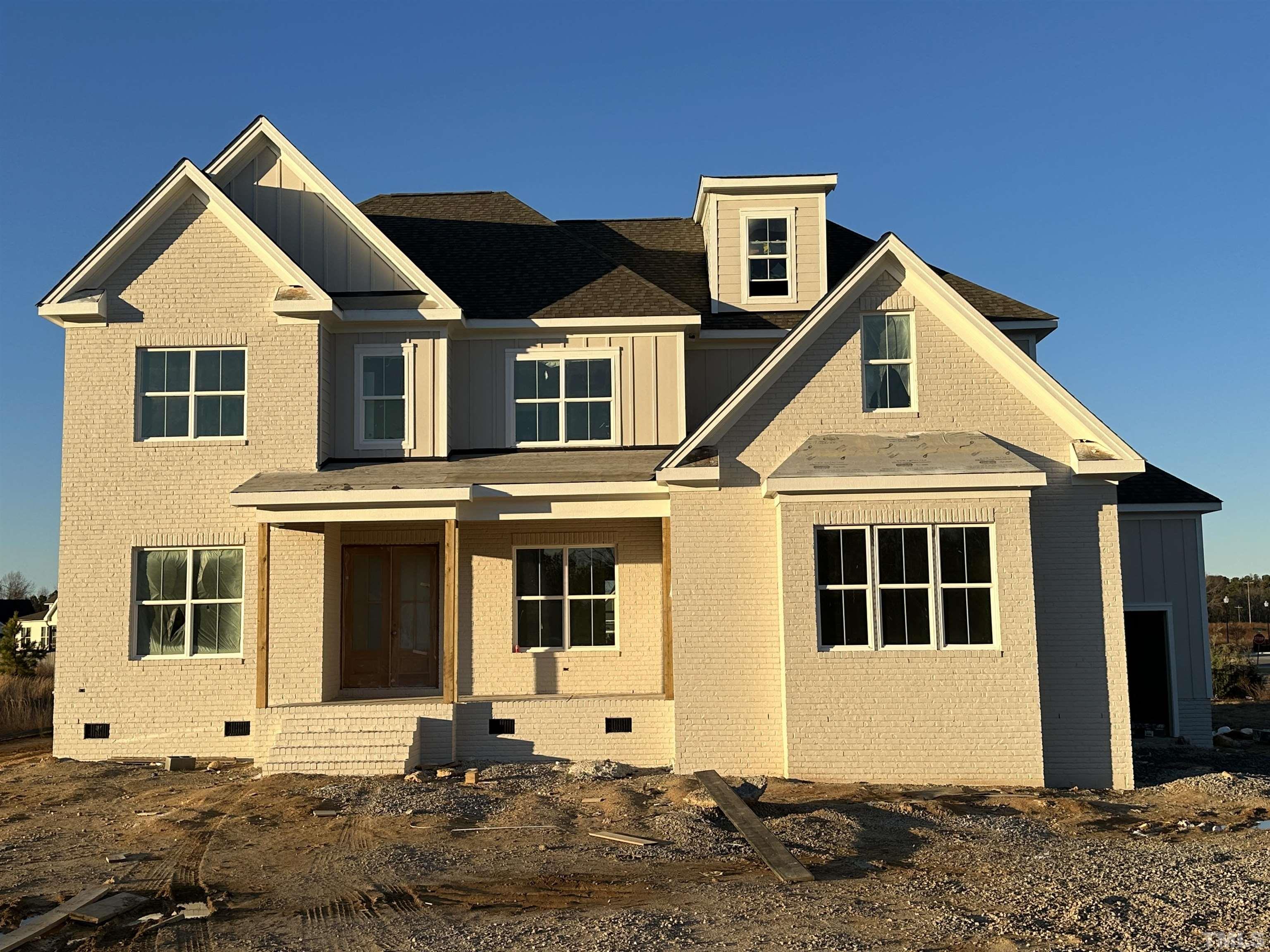 116 Sam Court Wake Forest, NC 27587 - Photo 1 of 22 a front view of a house with a yard