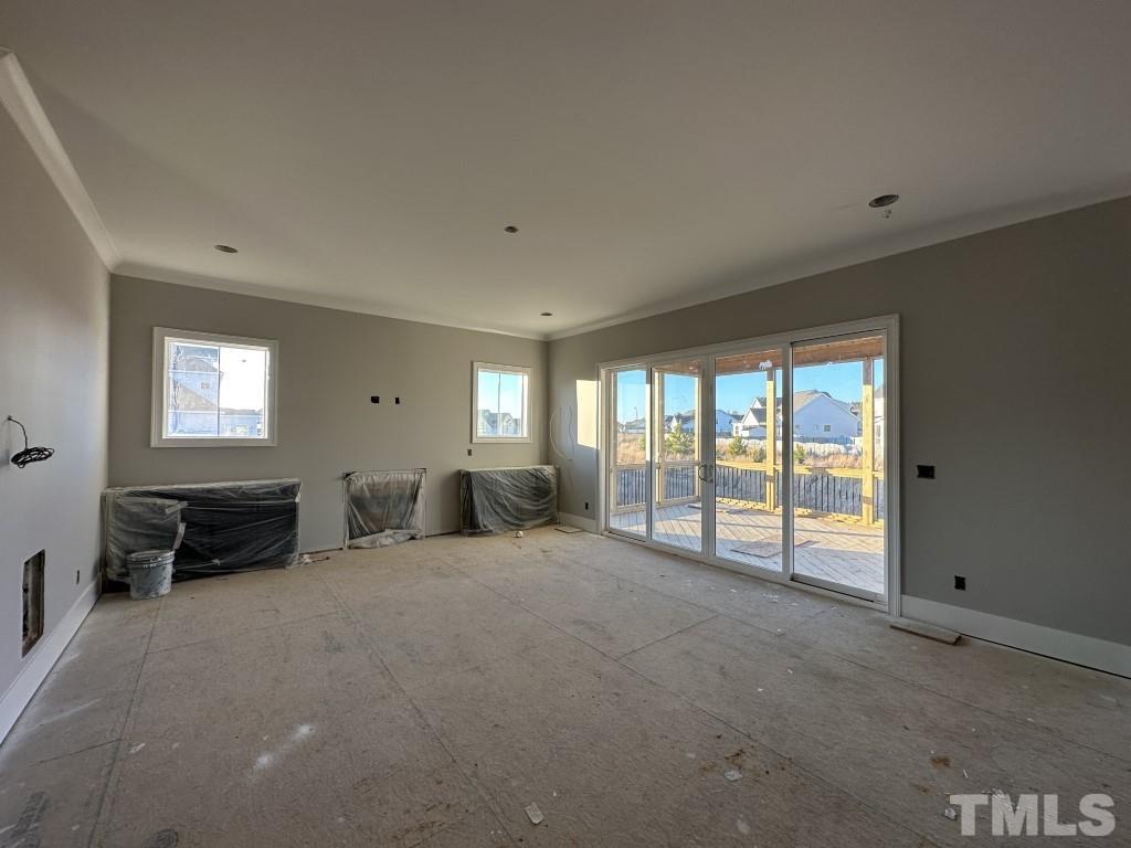 116 Sam Court Wake Forest, NC 27587 - Photo 5 of 22 a view of an empty room with a window