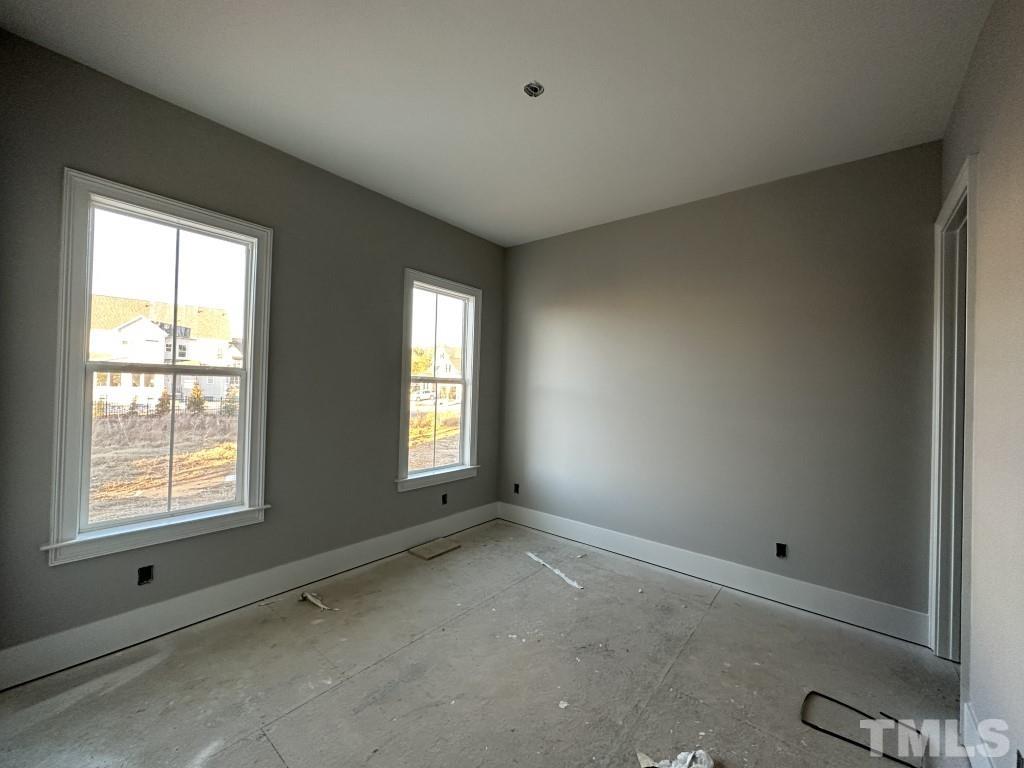 116 Sam Court Wake Forest, NC 27587 - Photo 9 of 22 an empty room with windows
