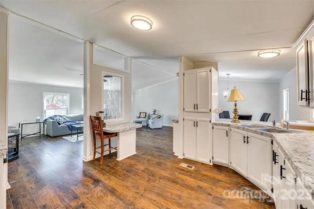 320 North Market Street Lancaster, SC 29720 - Photo 11 of 25 a large white room with a large window