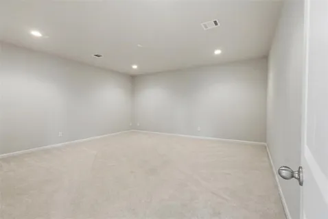 an empty room with a natural light