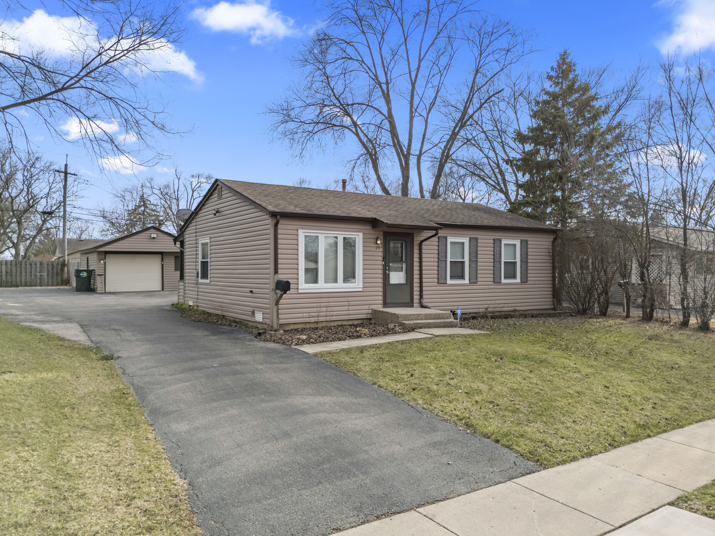 25 McCabe Drive Streamwood, IL 60107 - Photo 2 of 32 a view of a house with a yard
