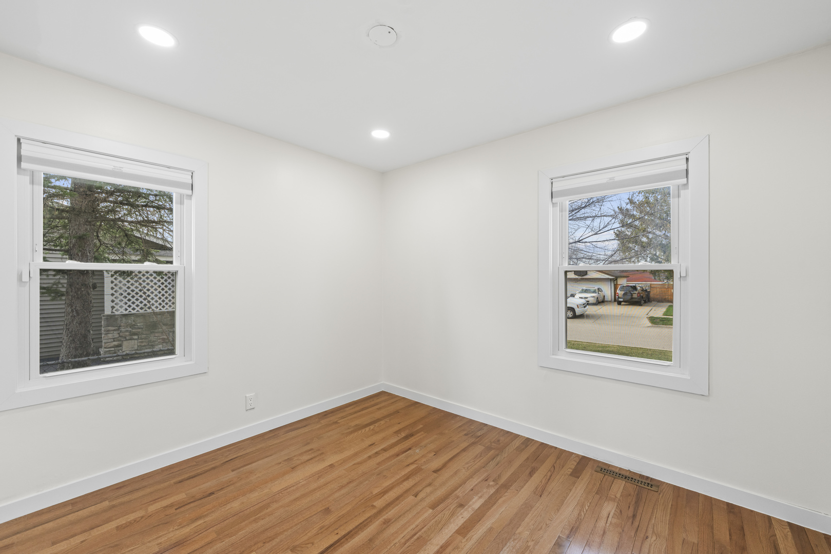 25 McCabe Drive Streamwood, IL 60107 - Photo 22 of 32 a view of room with window and wooden floor